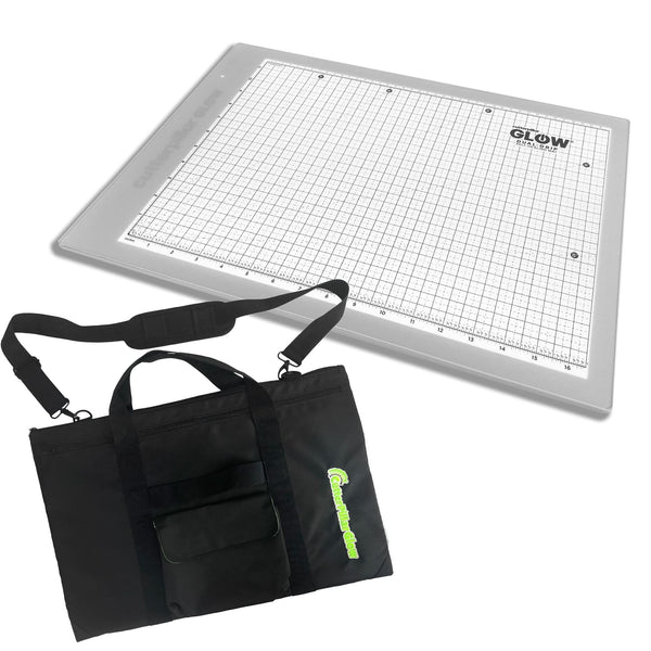 Grid cutting mat with carrying bag on a white background