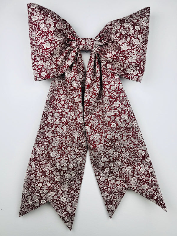 Floral patterned bow tie on a white background